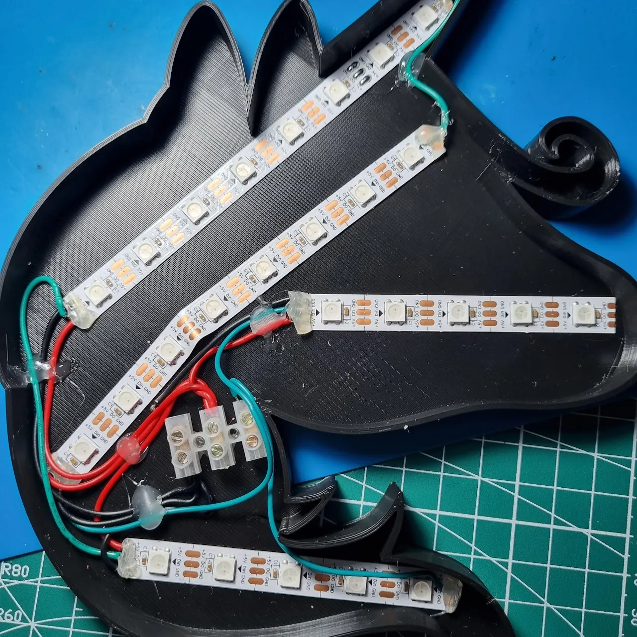 LED strips wired up and glued down.